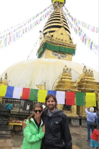 In front of the stupa that sits atop the religious complex.