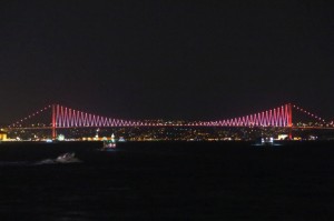 Bosphorus Bridge all lit up at night.