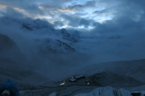 Just as first light started to break behind the mountains. You can see our digs at high camp below.