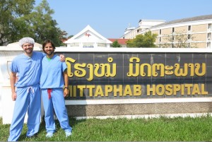 Ryan and Dave in front of Laos's Mittaphab Hospital.