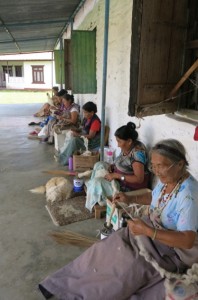 A group of friendly women preparing wool at a Tibetan Refugee Camp in Pokhara 