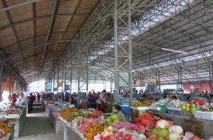 Surprisingly airy, colorful scene in the town market.