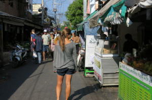 Exploring a morning market in search of our next meal.