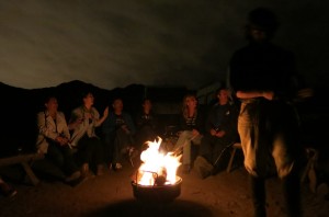 Campfire singing with new friends.