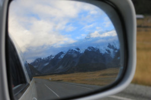 Leaving the park, putting Mt. Cook in the rearview... err, sideview... mirror.