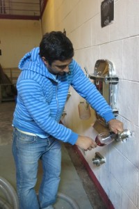 Ramiro pouring a Malbec straight from the wall casks.